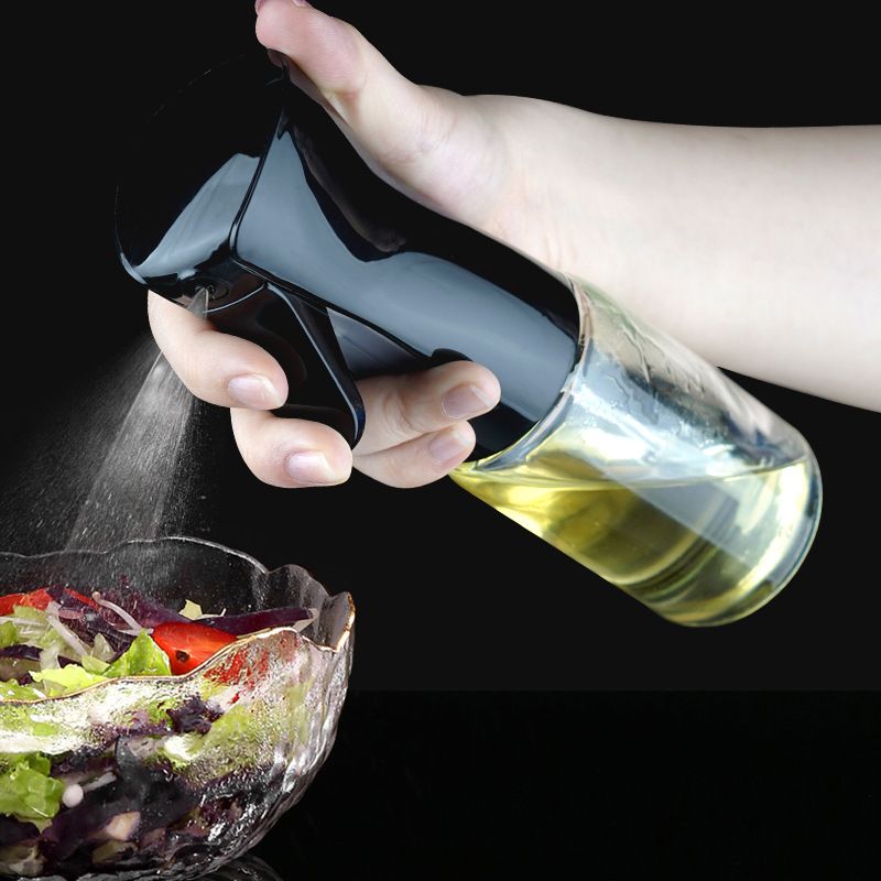 Glass vs plastic oil sprayer comparison — kitchen countertop display